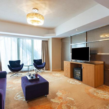 Holiday Inn Binhai Tianjin Buitenkant foto