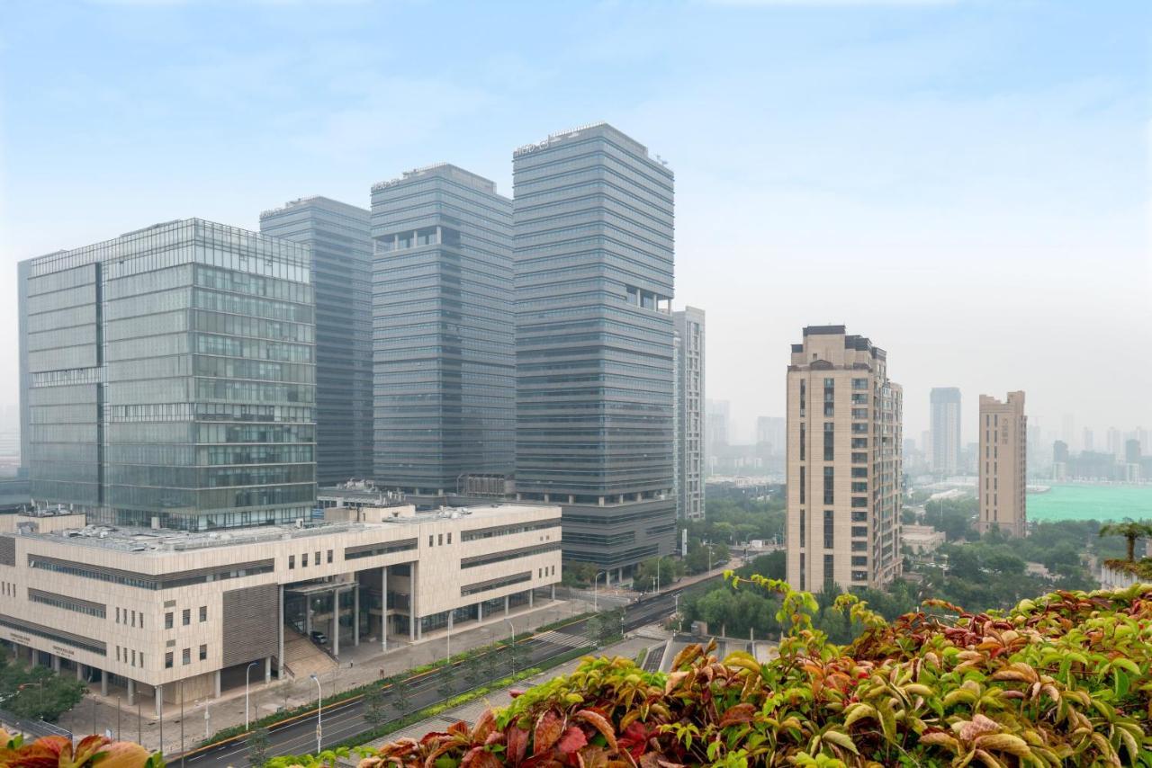 Holiday Inn Binhai Tianjin Buitenkant foto