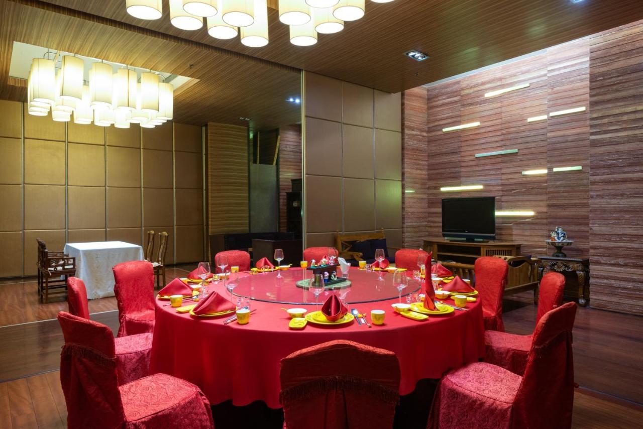 Holiday Inn Binhai Tianjin Buitenkant foto