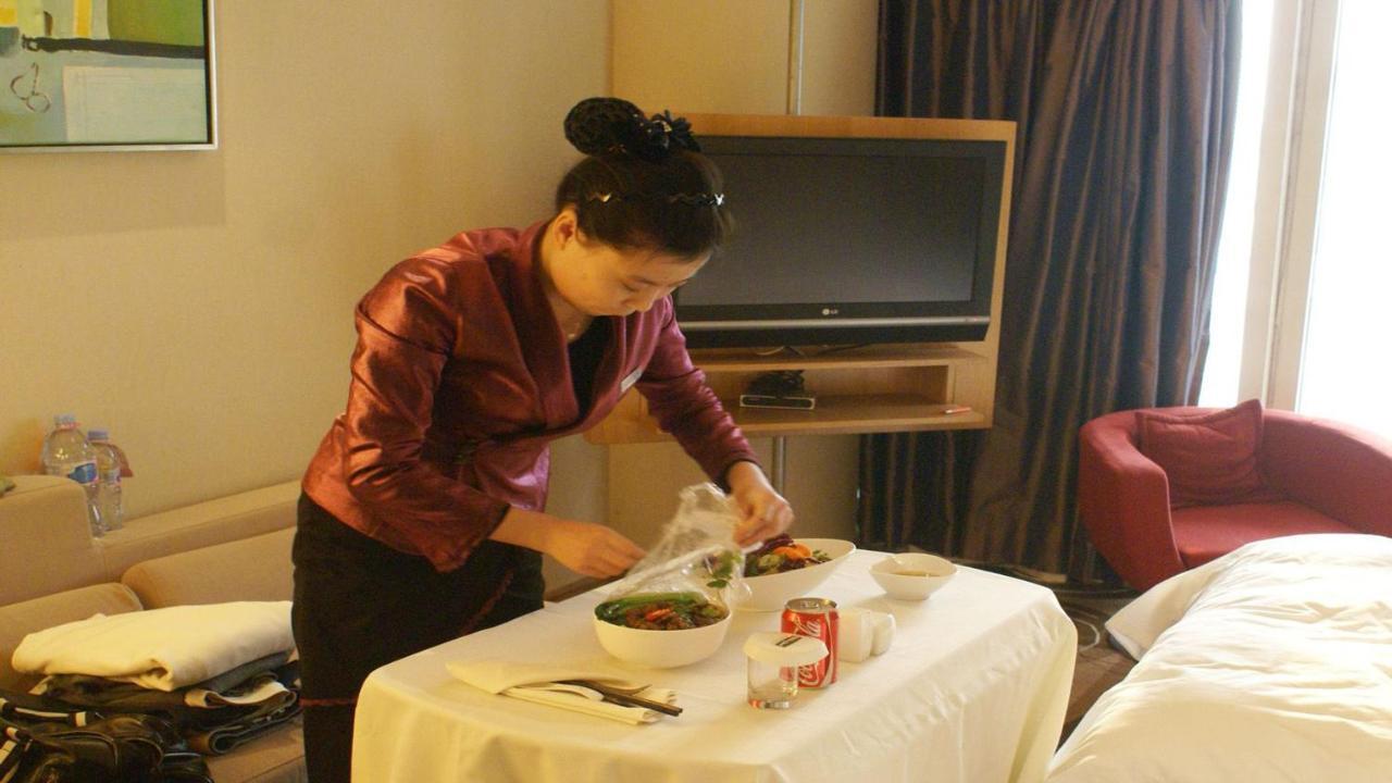 Holiday Inn Binhai Tianjin Buitenkant foto