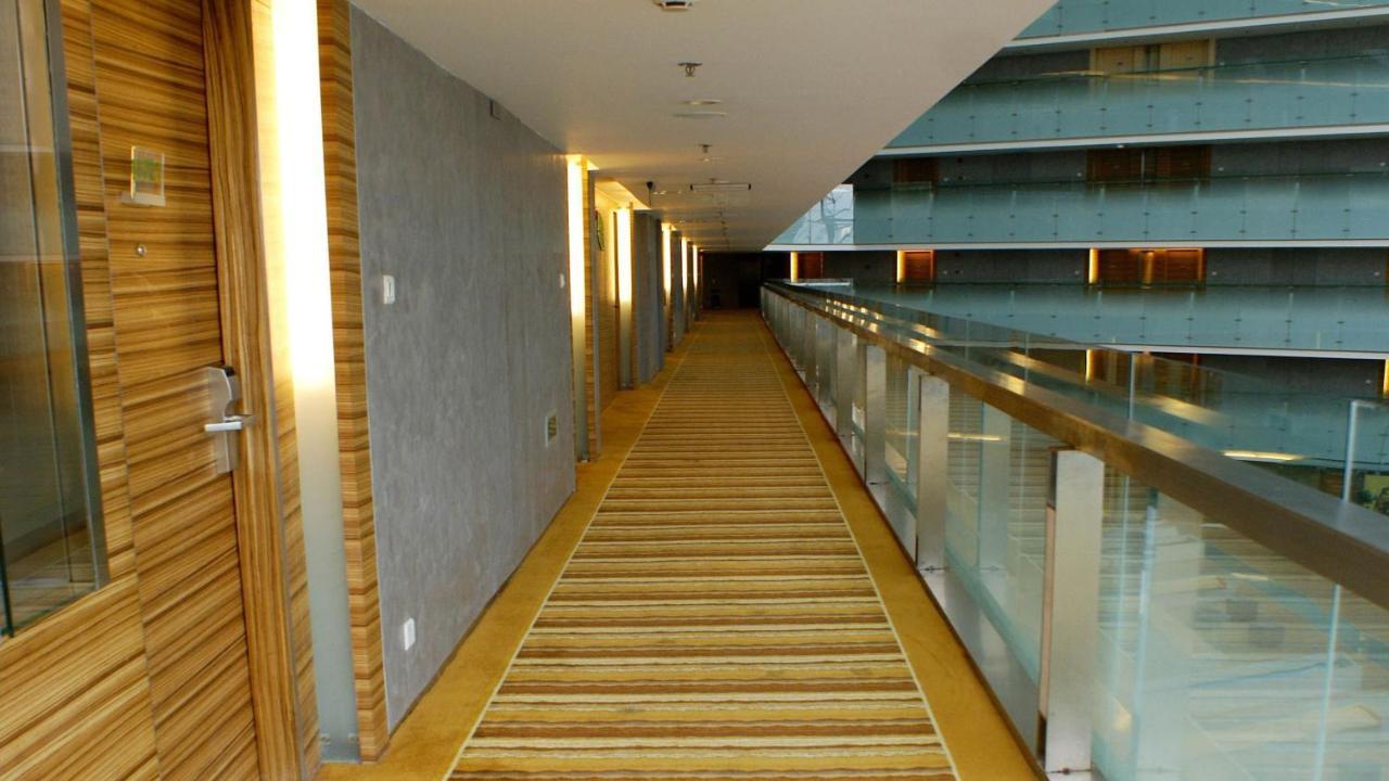 Holiday Inn Binhai Tianjin Buitenkant foto