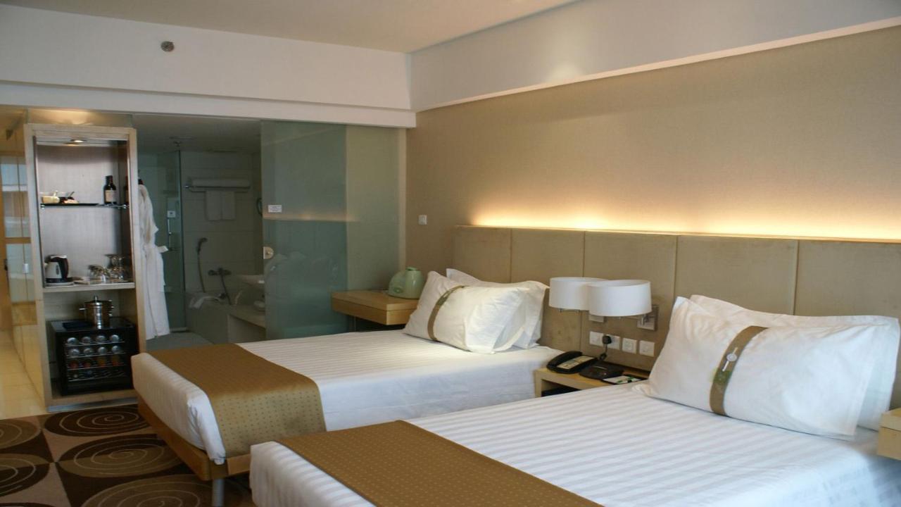 Holiday Inn Binhai Tianjin Buitenkant foto