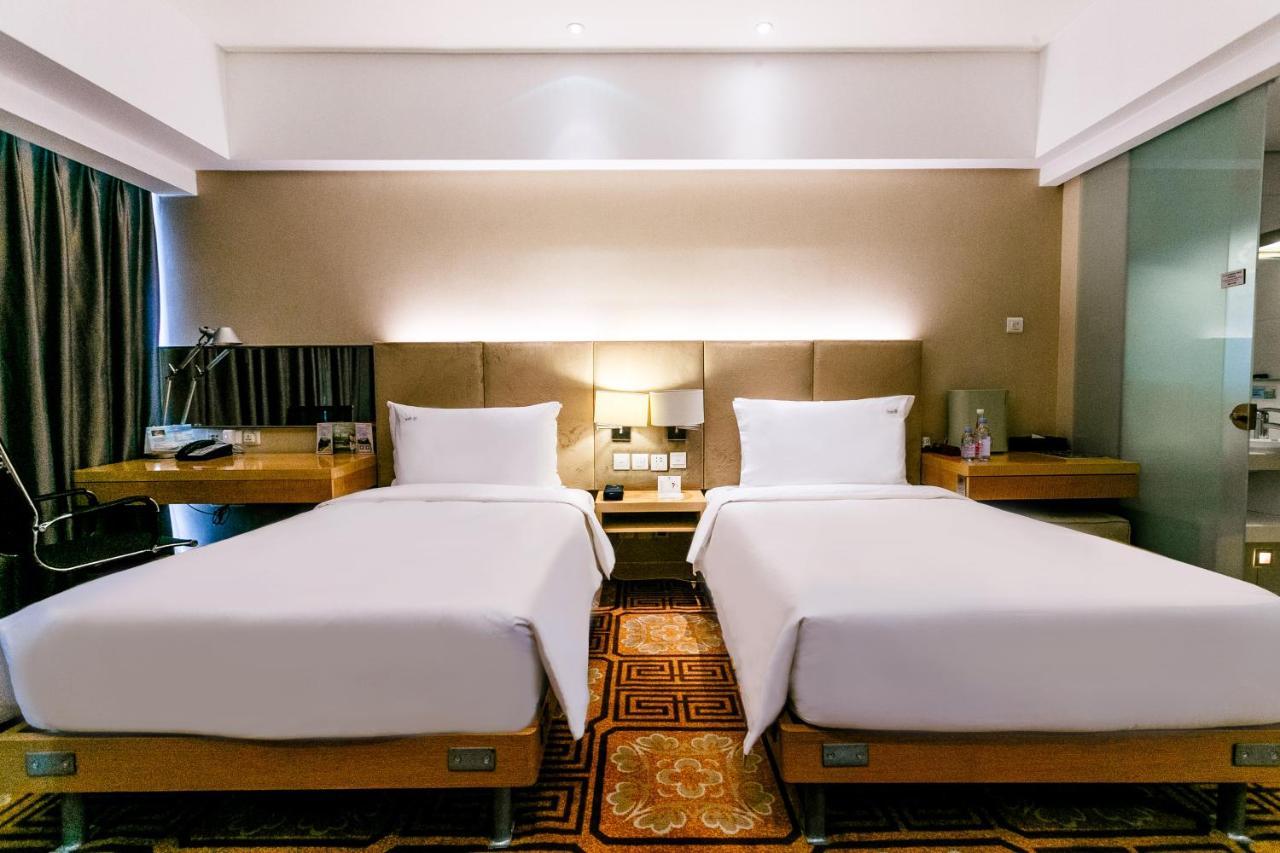 Holiday Inn Binhai Tianjin Buitenkant foto