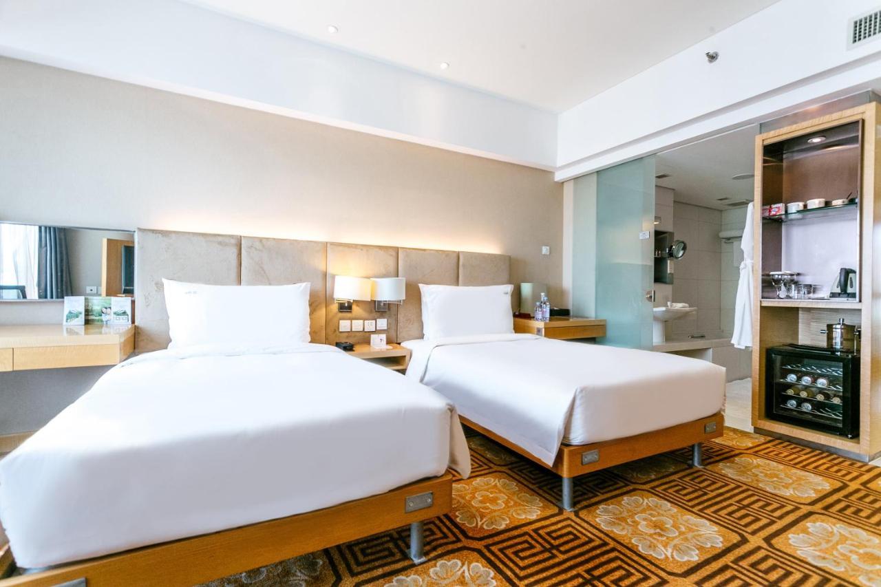 Holiday Inn Binhai Tianjin Buitenkant foto